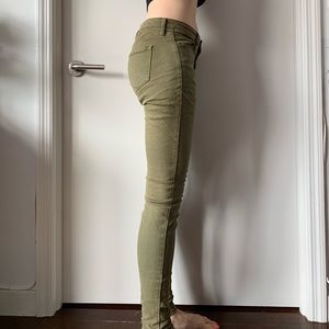 Army green Uniqlo skinny jeans